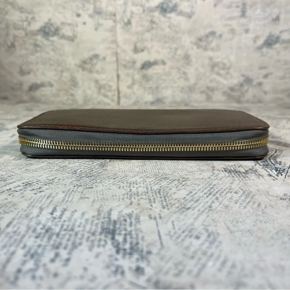 Neely Mack San Francisco zipper around brown leather wallet